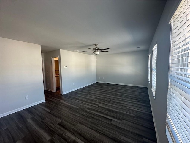 8664 Webb Rd, Riverdale, GA 30274 - unfurnished room featuring ceiling fan, dark wood finished floors, and baseboards