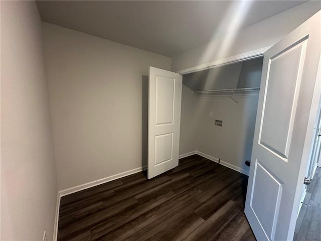 8664 Webb Rd, Riverdale, GA 30274 - washroom with dark wood finished floors, baseboards, and hookup for a washing machine