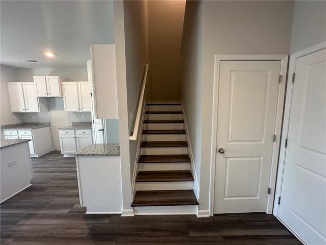 8664 Webb Rd, Riverdale, GA 30274 - stairs featuring wood finished floors, baseboards, and recessed lighting