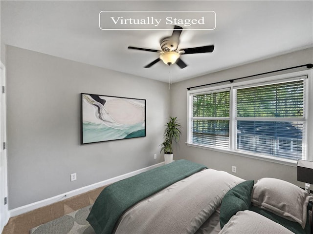 bedroom featuring ceiling fan