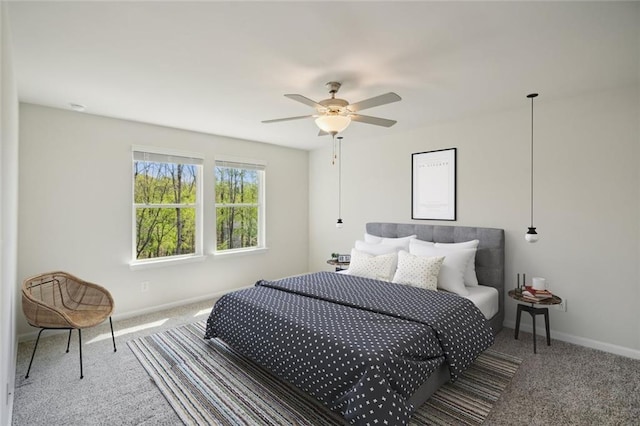 164 Long Leaf St, Dawsonville, GA 30534 - carpeted bedroom with ceiling fan and baseboards