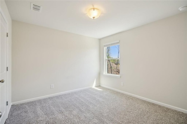 164 Long Leaf St, Dawsonville, GA 30534 - carpeted spare room with visible vents and baseboards