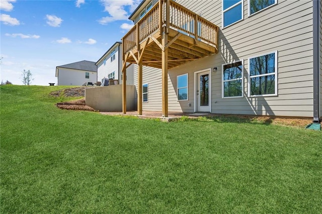 164 Long Leaf St, Dawsonville, GA 30534 - rear view of property featuring a wooden deck and a lawn