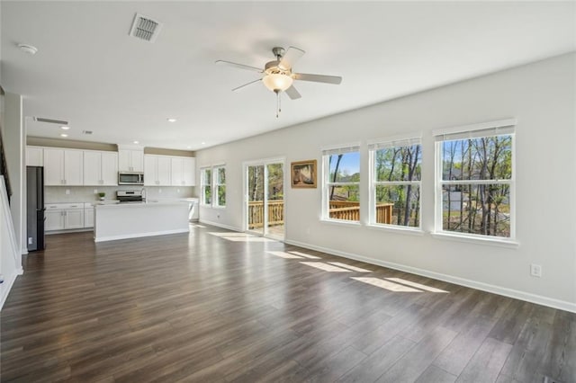 164 Long Leaf St, Dawsonville, GA 30534 - unfurnished living room with ceiling fan, baseboards, visible vents, and recessed lighting