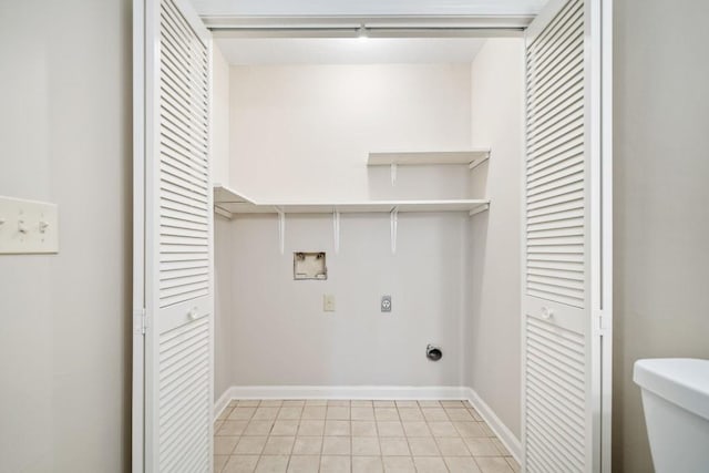 washroom featuring hookup for a washing machine, laundry area, electric dryer hookup, and baseboards