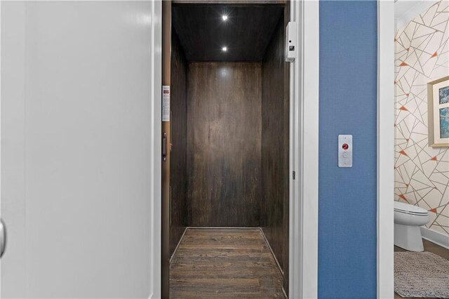 details with elevator and wood finished floors