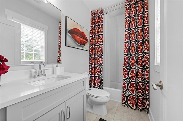 bathroom with shower / tub combo, tile patterned flooring, vanity, and toilet