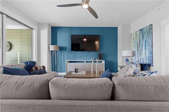 living room with a ceiling fan