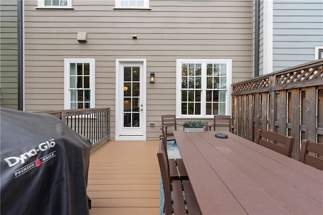 wooden terrace with area for grilling