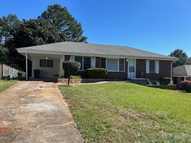 single story home with a carport and a front yard