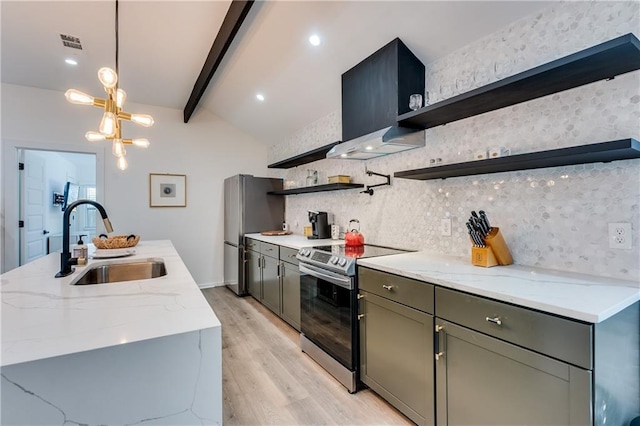 kitchen featuring stainless steel appliances, light stone countertops, sink, and light hardwood / wood-style flooring