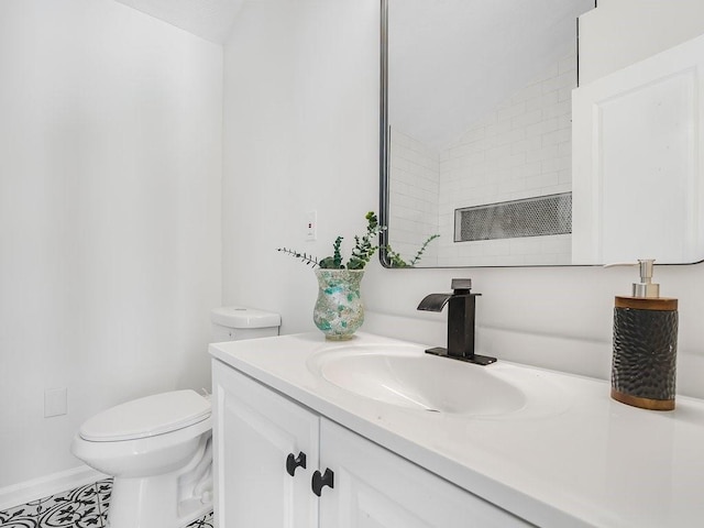 3100 Mount Gilead Rd SW, Atlanta, GA 30311 - bathroom with lofted ceiling and vanity