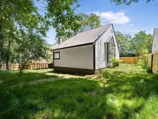 3100 Mount Gilead Rd SW, Atlanta, GA 30311 - view of side of home with a fenced backyard, crawl space, and a chimney