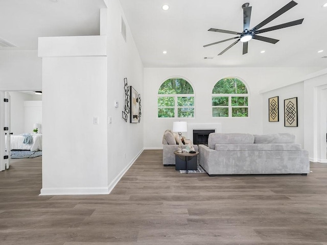 3100 Mount Gilead Rd SW, Atlanta, GA 30311 - living room with a ceiling fan, recessed lighting, a fireplace, and wood finished floors