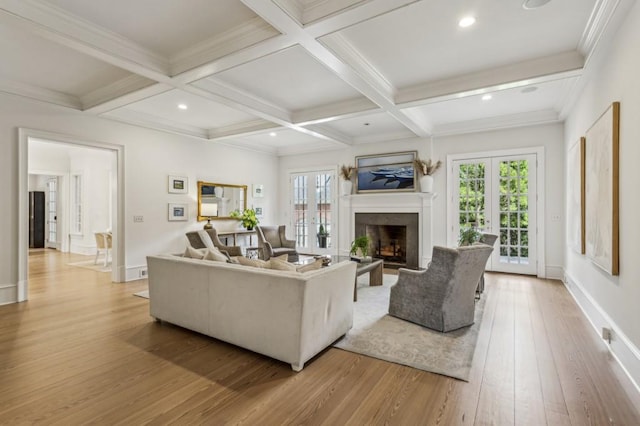 2671 Bohler Rd NW, Atlanta, GA 30327 - living area featuring light wood finished floors, a high end fireplace, beam ceiling, recessed lighting, and coffered ceiling
