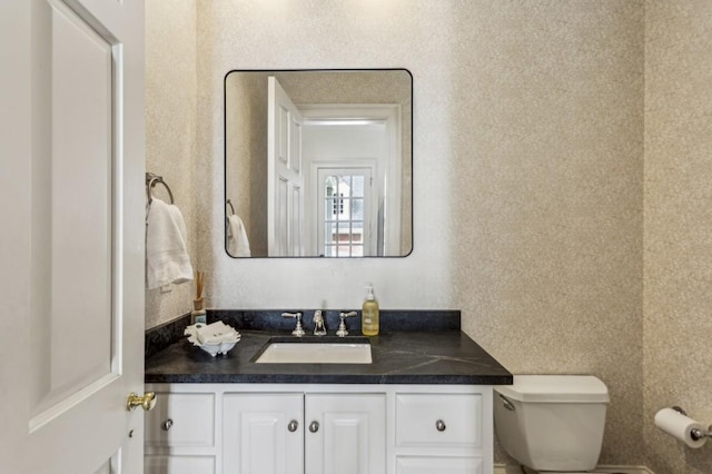 2671 Bohler Rd NW, Atlanta, GA 30327 - bathroom featuring toilet and vanity