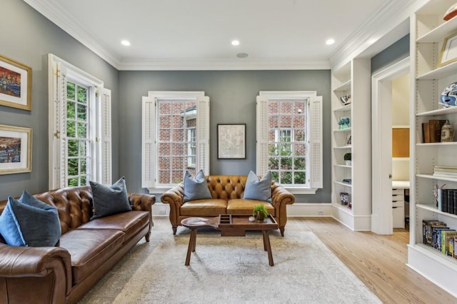 2671 Bohler Rd NW, Atlanta, GA 30327 - living area featuring wood finished floors, ornamental molding, and recessed lighting