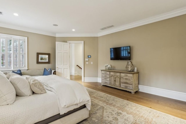 2671 Bohler Rd NW, Atlanta, GA 30327 - bedroom featuring wood finished floors, ornamental molding, and recessed lighting