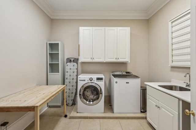 2671 Bohler Rd NW, Atlanta, GA 30327 - laundry room with washer and dryer, ornamental molding, cabinet space, and light tile patterned floors