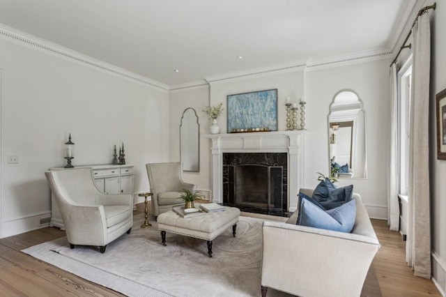 2671 Bohler Rd NW, Atlanta, GA 30327 - living room with crown molding, a high end fireplace, and wood finished floors