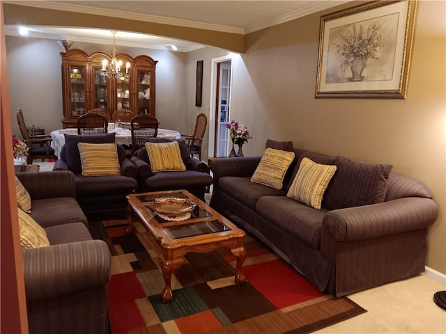 carpeted living room featuring a chandelier and ornamental molding