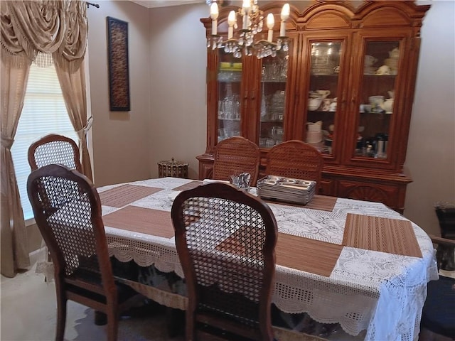 dining room with a notable chandelier