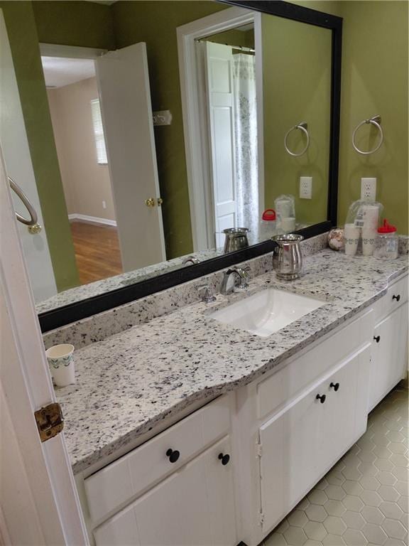 2479 Kingsland Dr, Dunwoody, GA 30360 - bathroom featuring vanity and tile patterned flooring