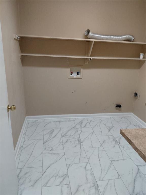 2479 Kingsland Dr, Dunwoody, GA 30360 - washroom with marble look tiles, washer hookup, baseboards, and electric dryer hookup