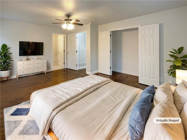 bedroom featuring ceiling fan and dark hardwood / wood-style flooring