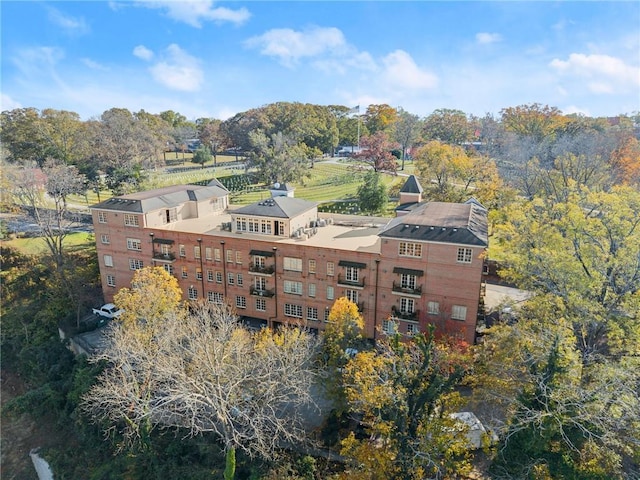 view of building exterior featuring covered parking