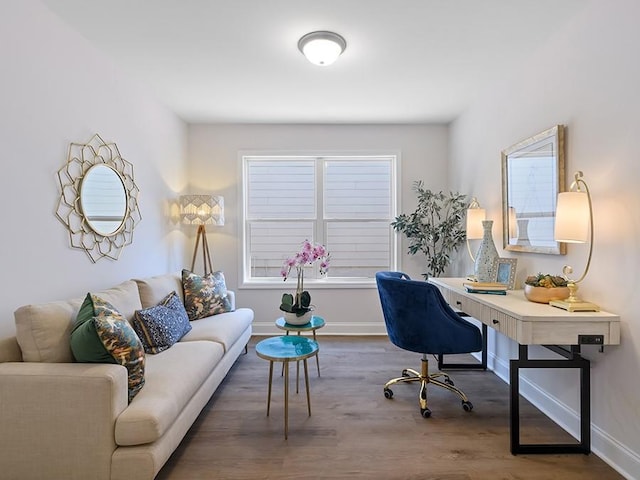 office space featuring dark wood-style flooring and baseboards