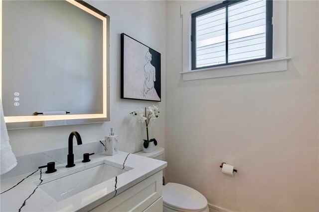 136 Beutell St, Norcross, GA 30071 - bathroom featuring toilet and vanity