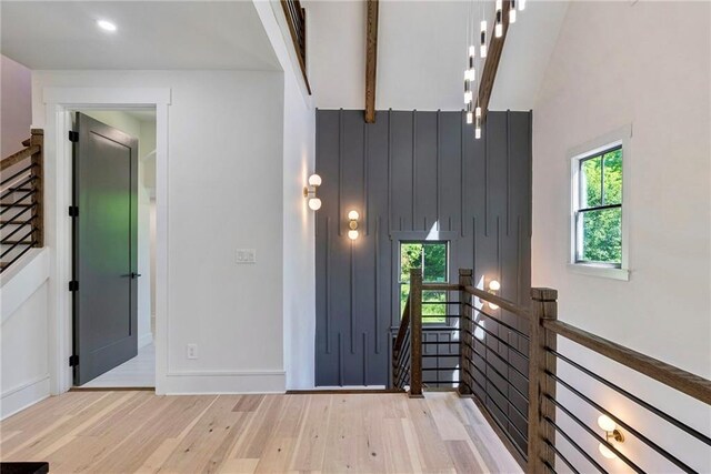 136 Beutell St, Norcross, GA 30071 - entrance foyer featuring light wood-type flooring, a high ceiling, and baseboards