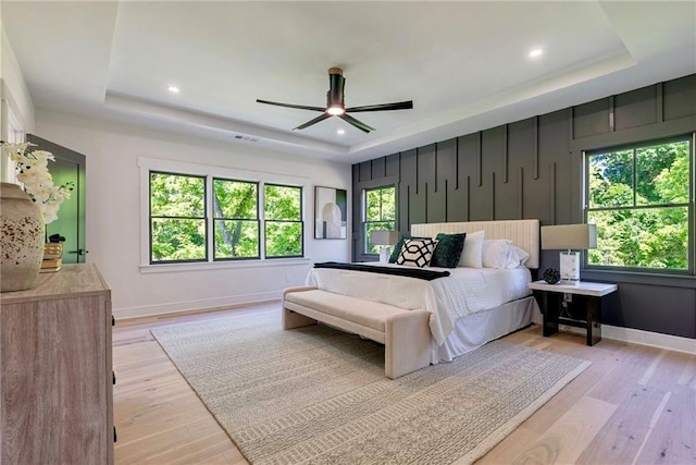 136 Beutell St, Norcross, GA 30071 - bedroom with a raised ceiling, baseboards, light wood-style floors, recessed lighting, and ceiling fan