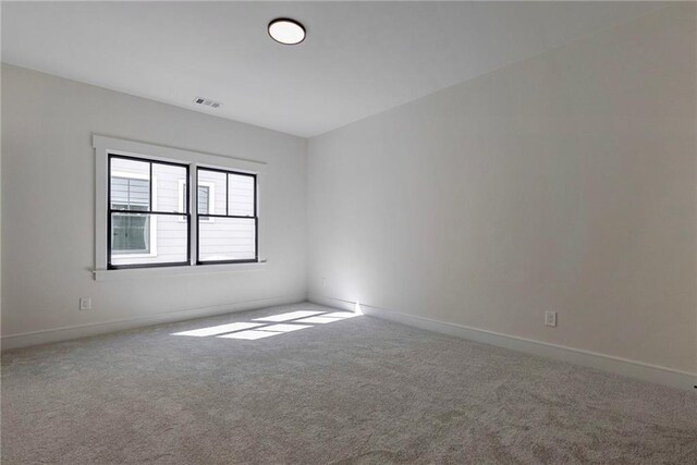 136 Beutell St, Norcross, GA 30071 - spare room with carpet flooring and baseboards