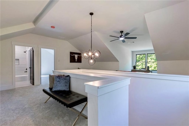 136 Beutell St, Norcross, GA 30071 - kitchen with lofted ceiling, light colored carpet, hanging light fixtures, and a ceiling fan