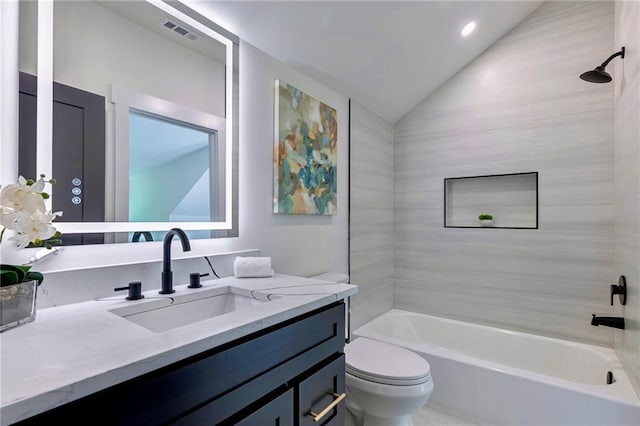 136 Beutell St, Norcross, GA 30071 - bathroom with vaulted ceiling, toilet, vanity, and  shower combination