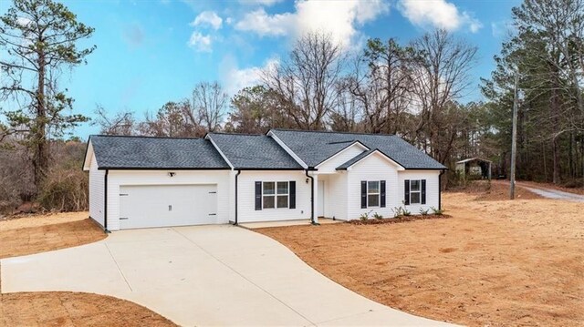 ranch-style home with a garage