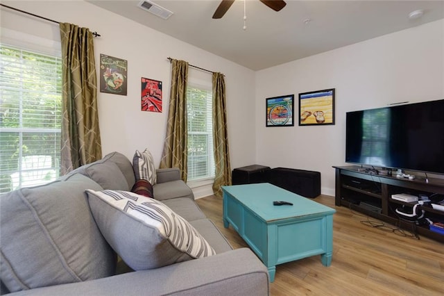 451 Burton Dr Unit 32, Alpharetta, GA 30009 - living room featuring a ceiling fan and light wood-style flooring