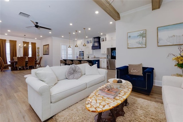 451 Burton Dr Unit 32, Alpharetta, GA 30009 - living room featuring healthy amount of natural light, light wood-style floors, ornamental molding, recessed lighting, and a ceiling fan