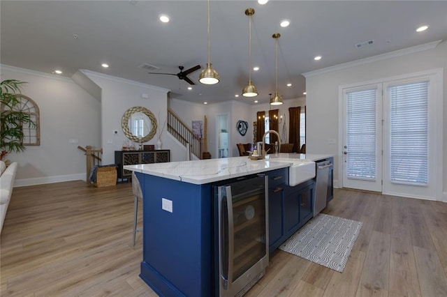 451 Burton Dr Unit 32, Alpharetta, GA 30009 - kitchen featuring wine cooler, dishwasher, blue cabinets, ornamental molding, and a sink