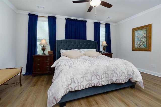 451 Burton Dr Unit 32, Alpharetta, GA 30009 - bedroom with baseboards, wood finished floors, ornamental molding, and a ceiling fan