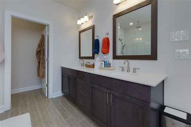 451 Burton Dr Unit 32, Alpharetta, GA 30009 - bathroom with tiled shower, baseboards, and double vanity