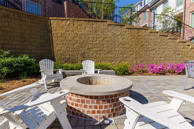 451 Burton Dr Unit 32, Alpharetta, GA 30009 - view of patio / terrace featuring an outdoor fire pit and stairway