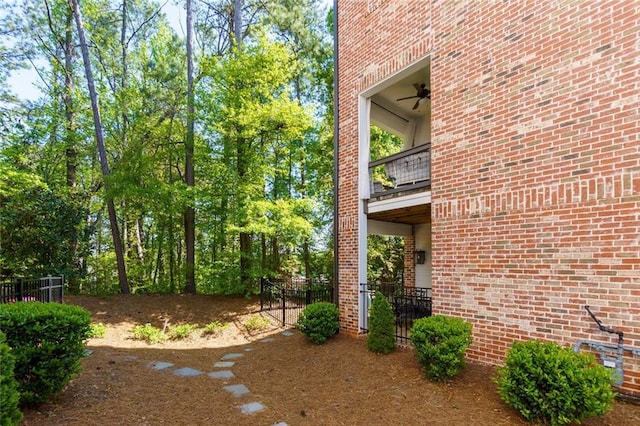 451 Burton Dr Unit 32, Alpharetta, GA 30009 - view of yard with a balcony and fence