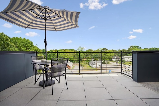 view of patio / terrace featuring a balcony