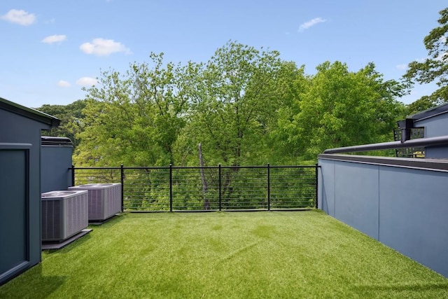 view of yard with central AC unit