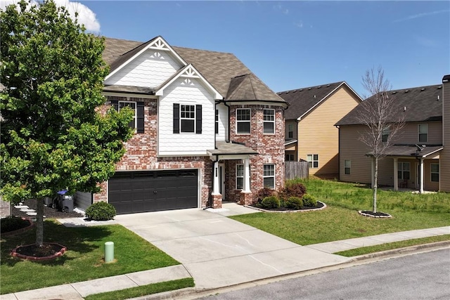 4171 Towncastle Ln, Buford, GA 30518 - view of front of house with concrete driveway, brick siding, a front yard, and a garage