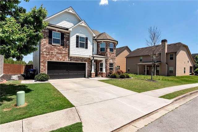 4171 Towncastle Ln, Buford, GA 30518 - craftsman-style home featuring an attached garage, concrete driveway, brick siding, and stone siding