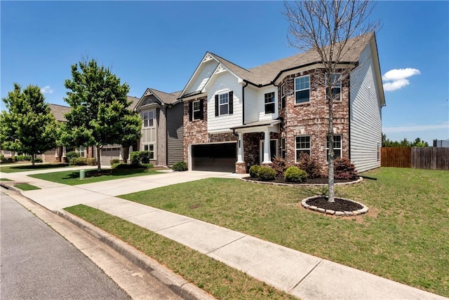 4171 Towncastle Ln, Buford, GA 30518 - view of front facade featuring concrete driveway, an attached garage, stone siding, and brick siding